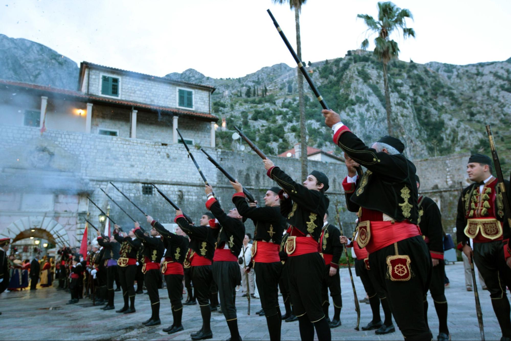 A guild during a festival in the old town of Kotor in the inner Bay of Kotor in Montenegro in the Mediterranean in Europe
