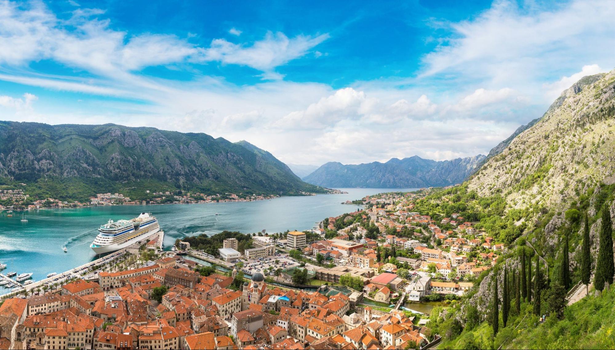 Bay of Kotor with birds-eye view. The town of Kotor, Muo, Prcanj, Tivat. View of the mountains, sea, clouds