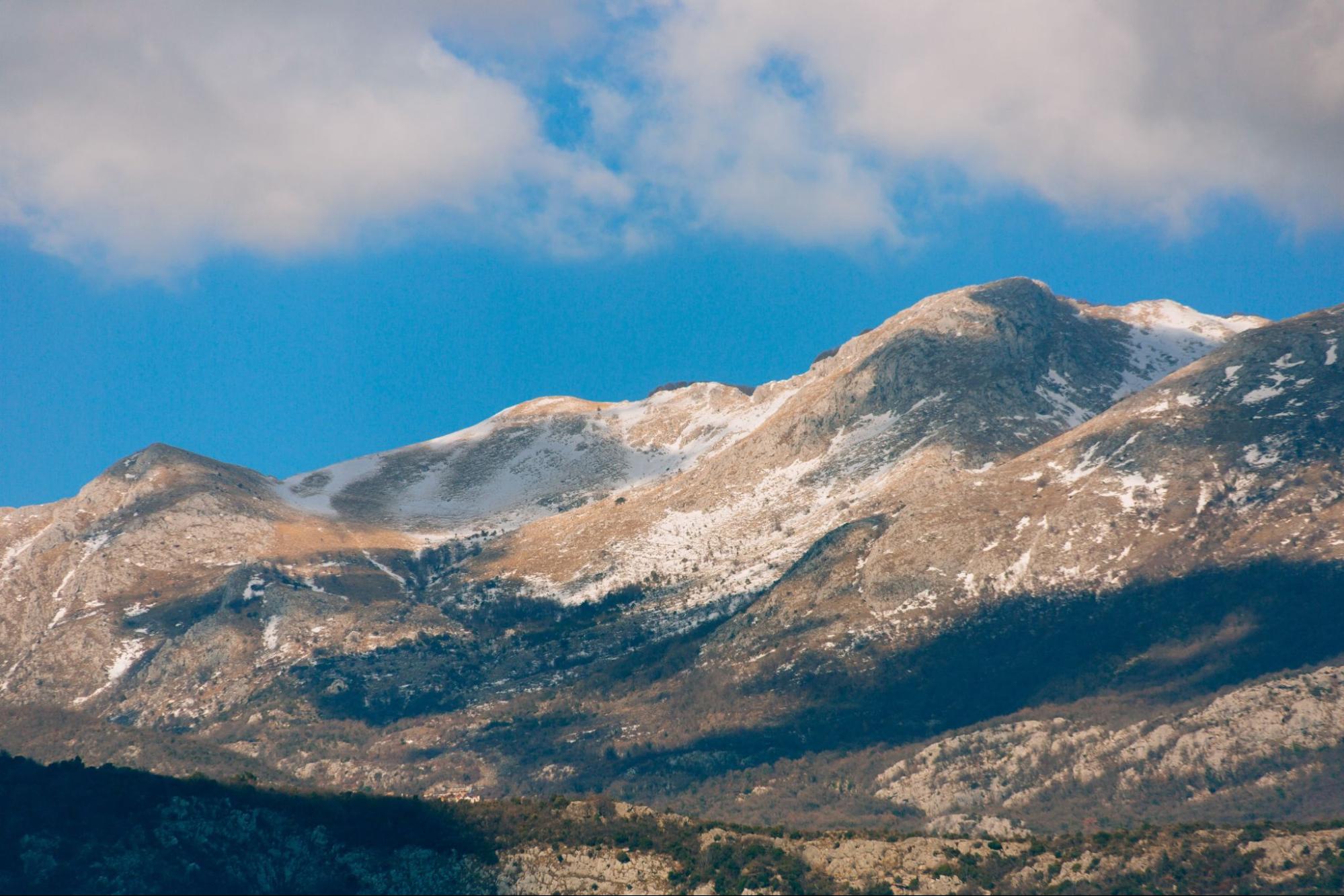 Mountains in Montenegro in the snow, near the coast