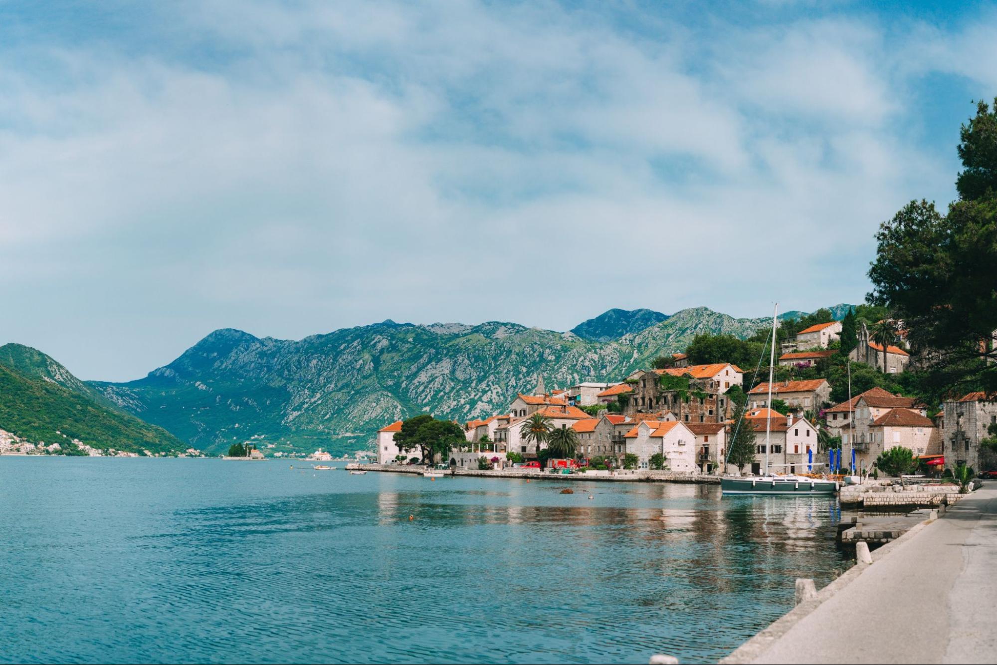 The old town of Perast on the shore of Kotor Bay, Montenegro. The ancient architecture of the Adriatic and the Balkans. Fishermens cities of Europe.